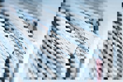 Close up of a stack of newspapers 